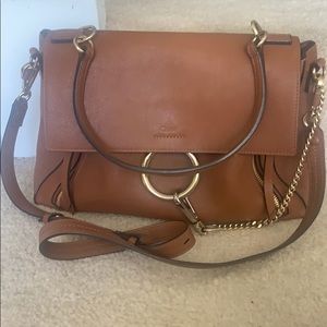 Chloe
Faye Day Pebbled Ring Shoulder…